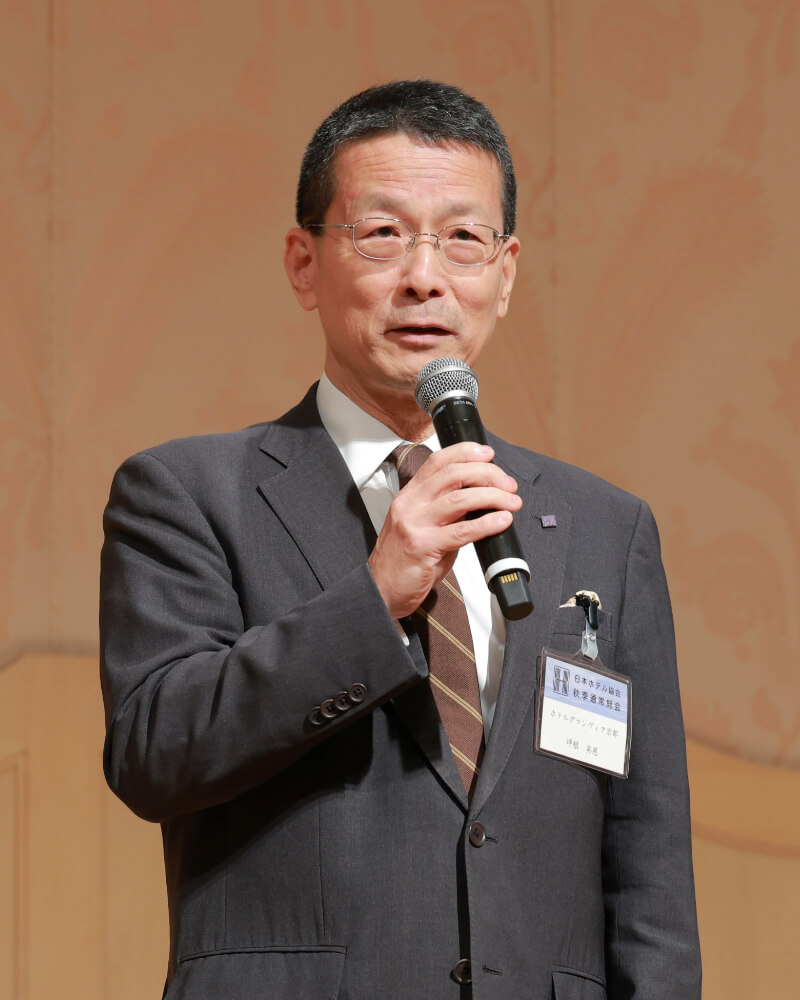 新任理事の坪根英慈氏